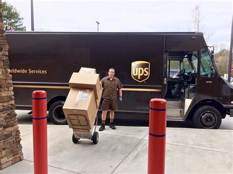 Ups Driver His Van And Parcels Ups Parcel Delivery Commercial Vehicle Ups Driver His Van And Parcels Ups Parcel Delivery Commercial Vehicle